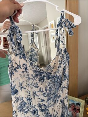 Reformation White and Blue Floral Tie-Shoulder jumpsuit